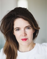 Portrait souriant<br />India Lange